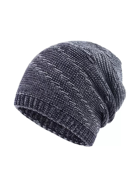Knitted beanie hat on a white background